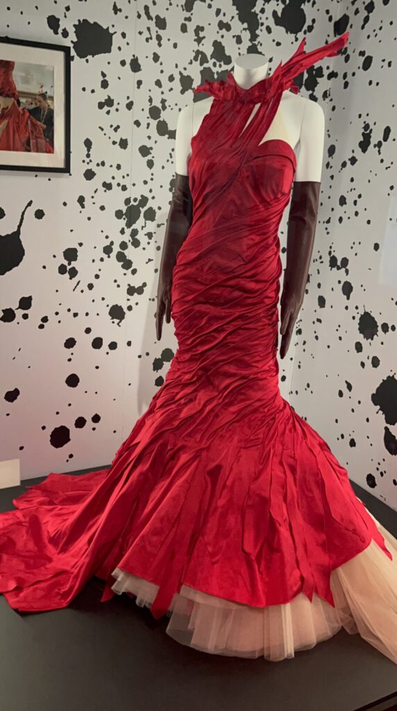cruella Emma Stone's red dress from Cruella at Disney 100 Exhibition
