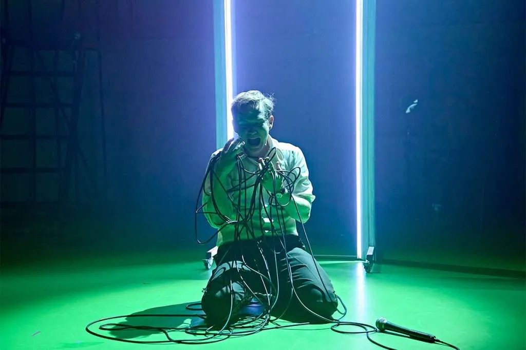 Kenrex Southwark Playhouse Review – Jack Holden performing an intense scene from the one-man show.