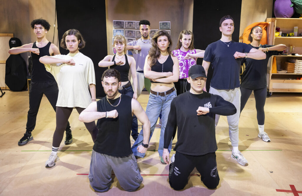 The touring cast of Cruel Intentions 2025 in rehearsals - Pamela Raith Director Jonathan O'Boyle giving notes to the cast during a rehearsal break of Cruel Intentions: The '90s Musical UK and Ireland tour.