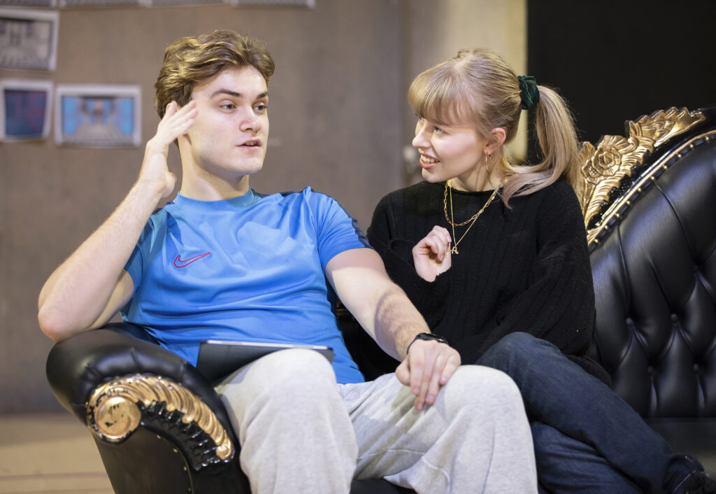 Will Callan (Sebastian) and Abbie Budden (Annette) in rehearsals - Pamela Raith Director Jonathan O'Boyle giving notes to the cast during a rehearsal break of Cruel Intentions: The '90s Musical UK and Ireland tour.