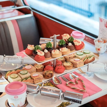 Festive afternoon tea served on Brigit’s Bakery Christmas Lights Bus Tour in London