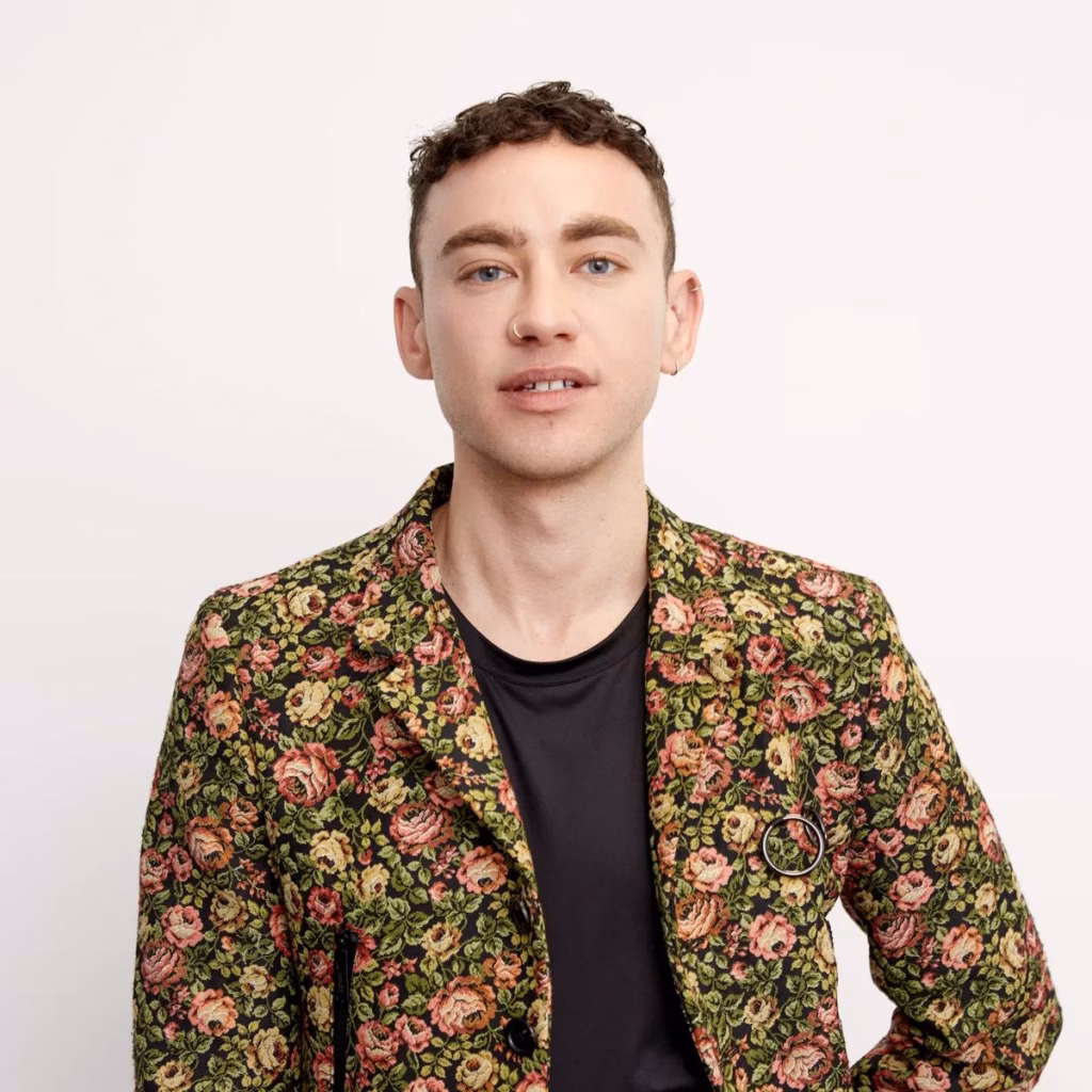 Olly Alexander wearing a floral jacket for The Future of Queer Storytelling at Southbank Centre