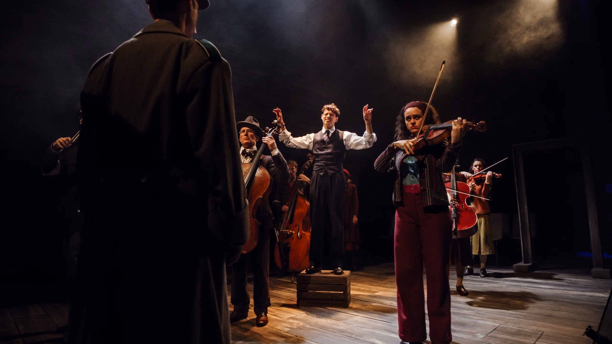 Scene from The Pianist musical featuring the actor-musician company
